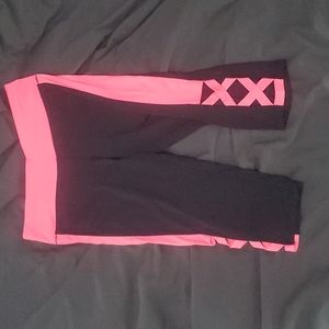 Material Girl capri leggings with cutout detail. Never worn. Size M